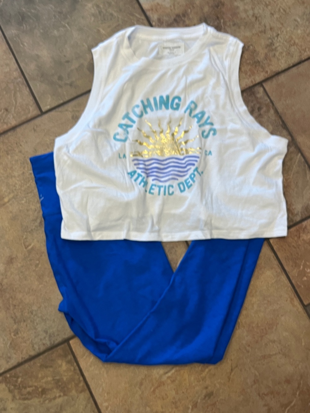 Beyond Yoga White Crop Tank with Gold Sun & Turquoise Graphic, Blue Leggings